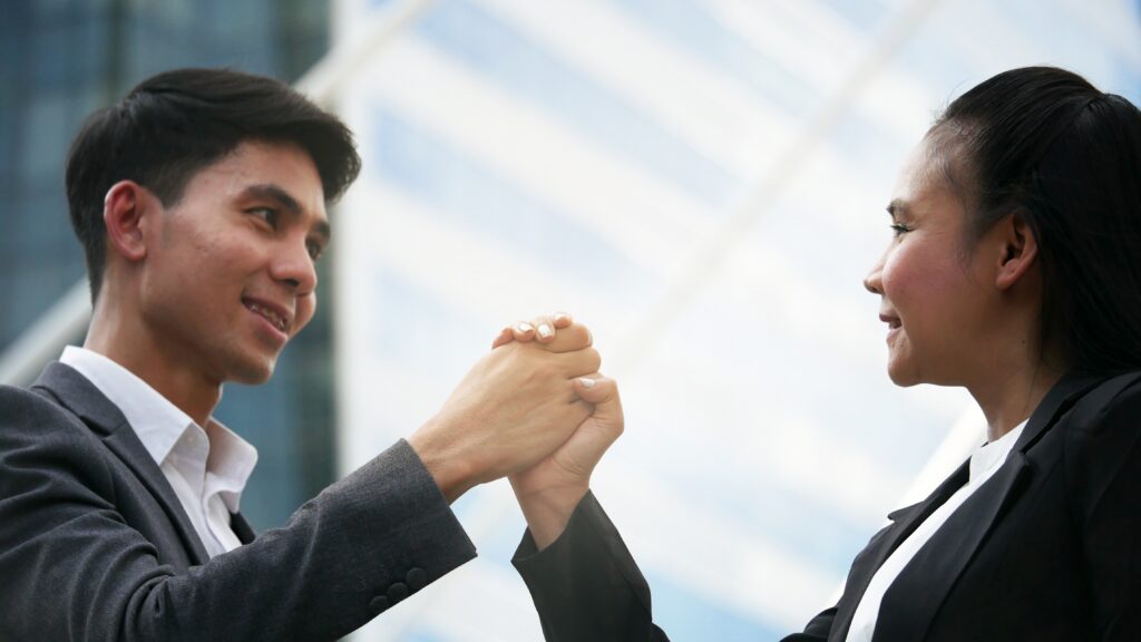 A young professional getting into sales with another person